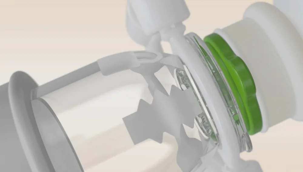 Vue rapprochée de la cloche transparente et du joint vert qui assurent la micro-dépression.